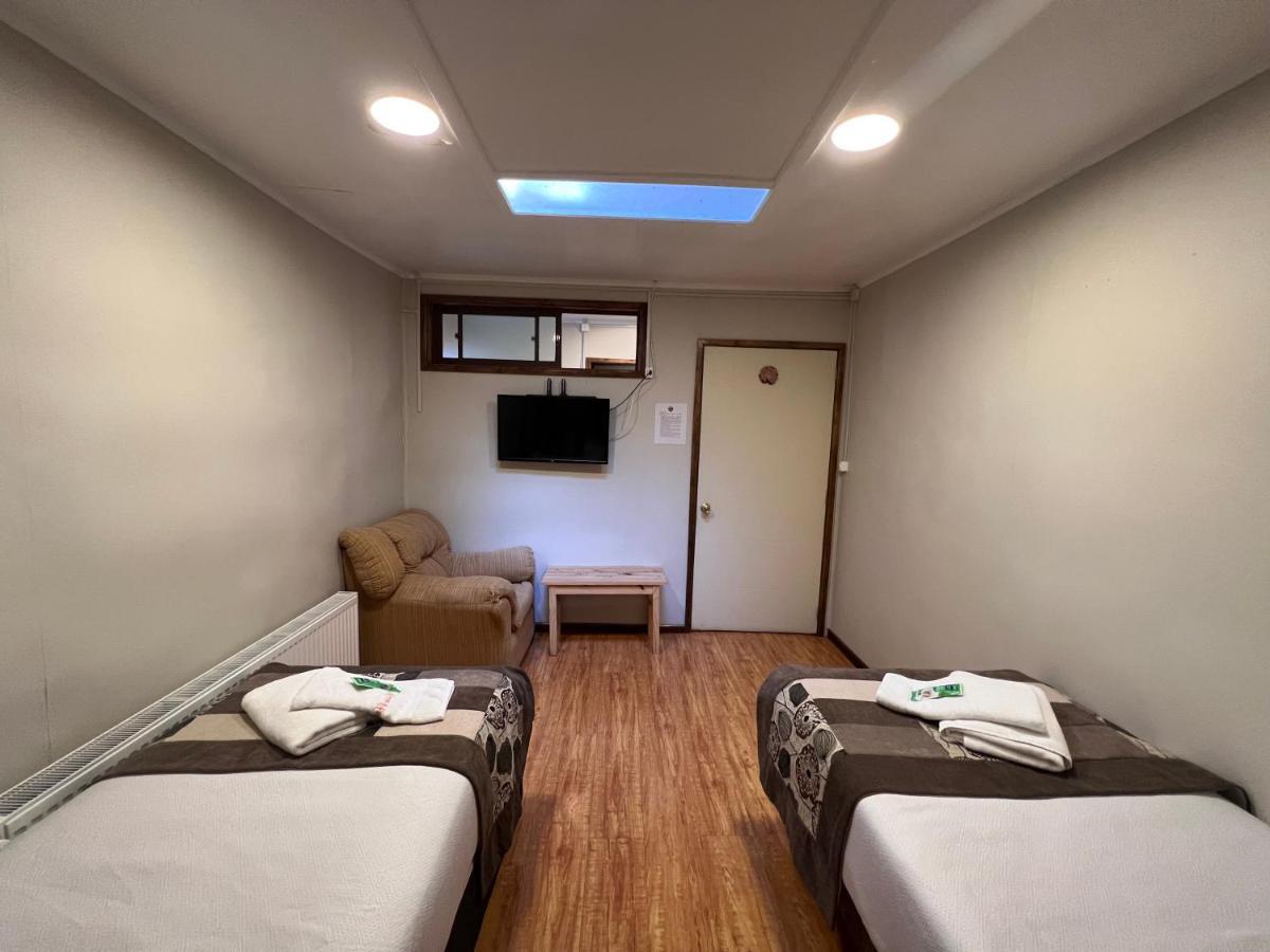 Hostal Reymer Patagonia Пуэрто-Наталес Экстерьер фото