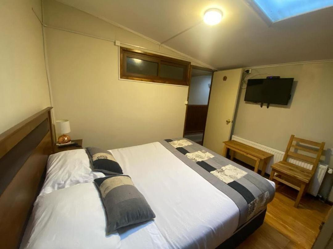 Hostal Reymer Patagonia Пуэрто-Наталес Экстерьер фото